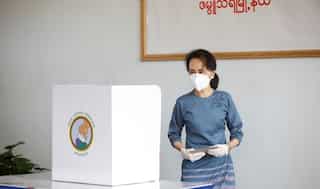 Myanmar's Suu Kyi casts early vote in poll hit by COVID-19 curbs