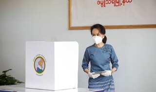 Myanmar's Suu Kyi casts early vote in poll hit by COVID-19 curbs