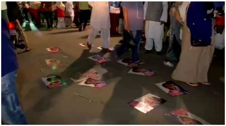 Posters of Emmanuel Macron pasted on road in Mumbai, police remove them