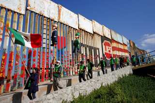 Protesters in Mexico burn Trump effigy, slam US border policy