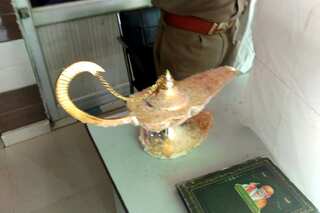Indian doctor duped into buying 'Aladdin's lamp' after genie show