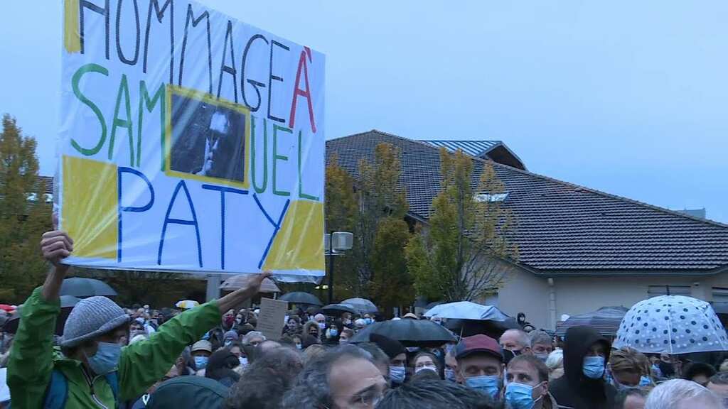 France honours slain teacher as school resumes