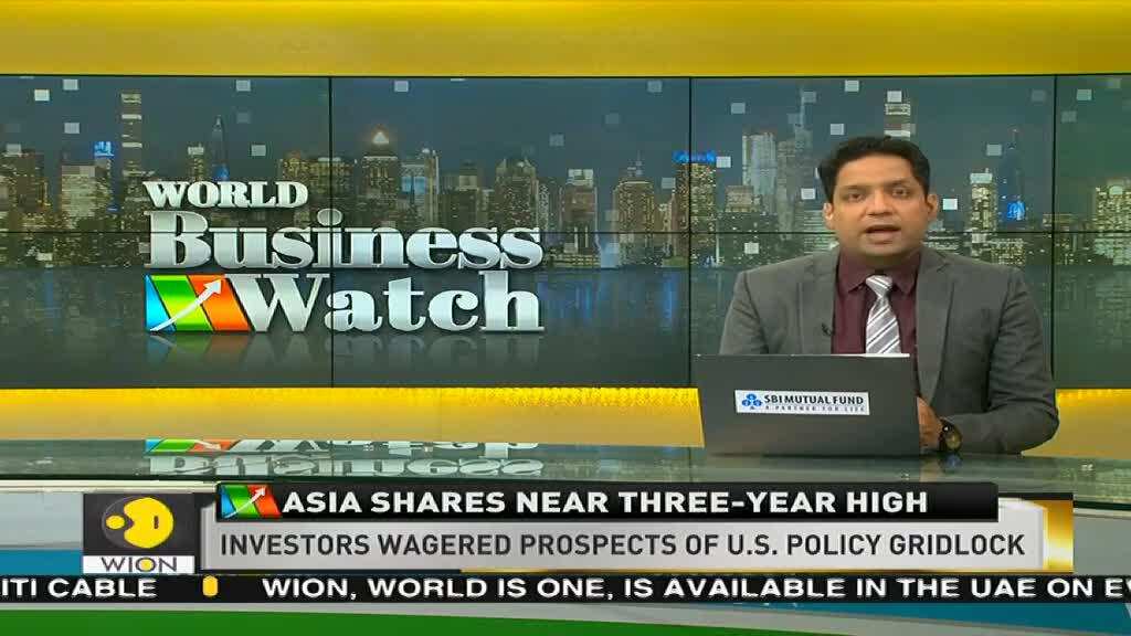 Asian shares rally to near 3-year high