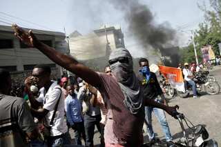 Hundreds march in Haiti after outrage over student's slaying