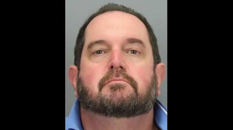 US college teacher to face trial for threatening health official over COVID-19 restrictions