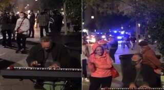 ‘Major 2020 energy’: Pianist calmly plays on the street amid violent anti-lockdown protests in Barcelona