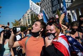 US cities erupt into celebrations, scramble for champagne after Biden win