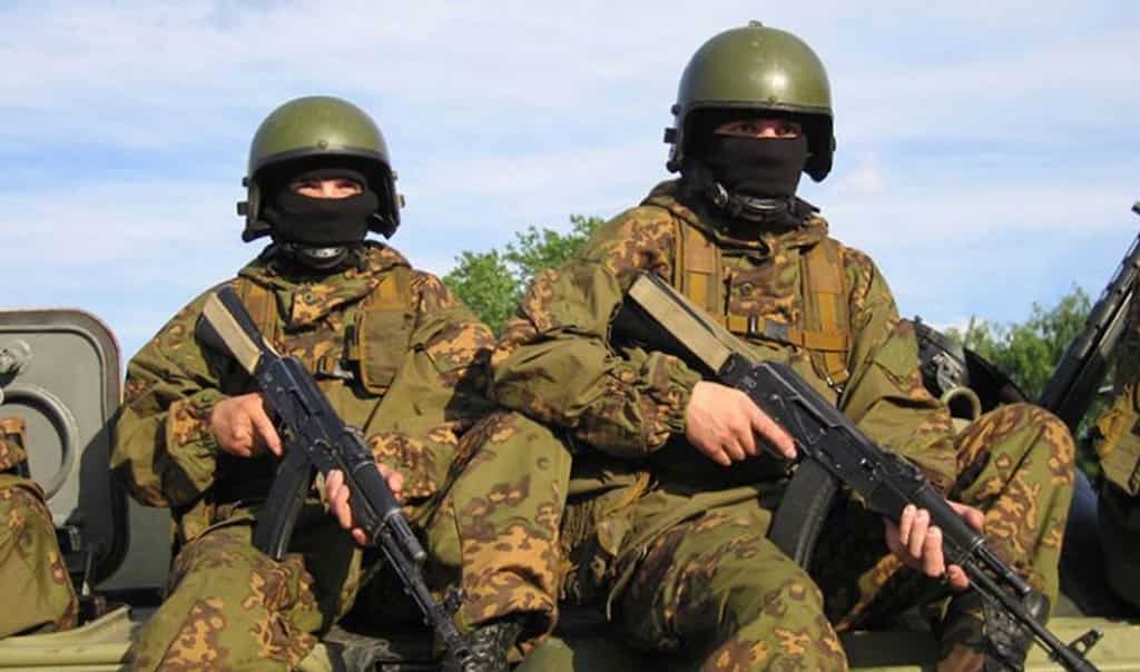 Three dead in axe and gun attack at Russian military base
