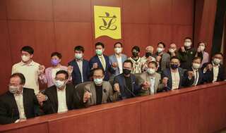 Hong Kong pro-democracy lawmakers threaten mass resignation against Beijing