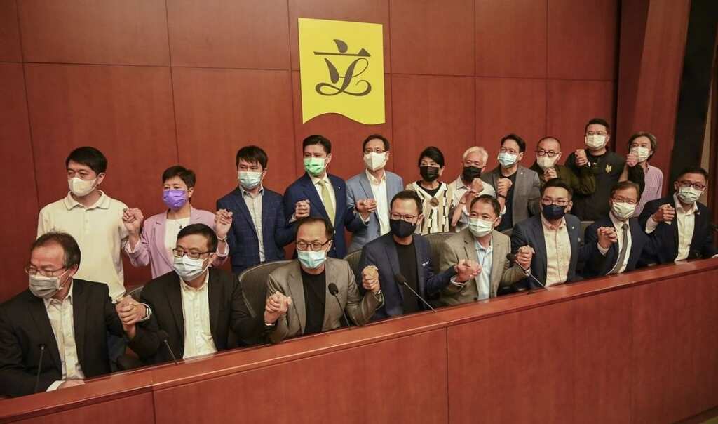 Hong Kong ousts four pro-democracy lawmakers for 'endangering security'