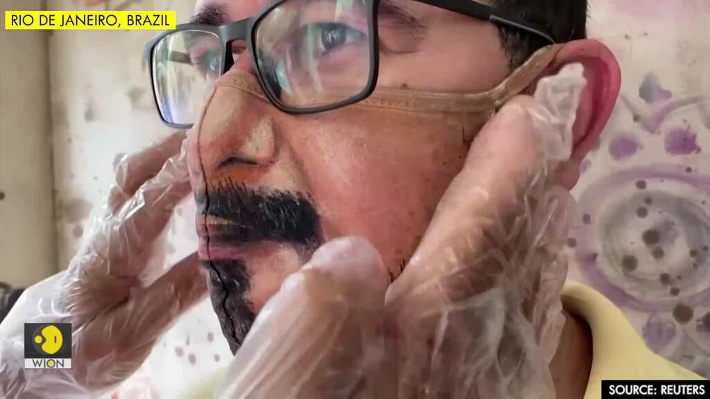 Brazil artist paints masks for those who want to show their face