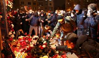 Candles and condemnation: Thousands rally in Belarus after opposition protester's death