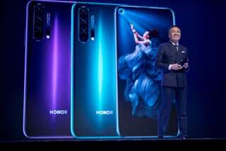 Huawei sells off budget phone brand as US pressure bites