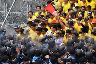 At least 55 injured as Thai anti-government protesters clash with police, royalists