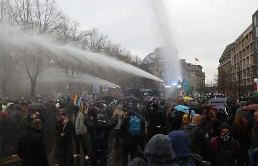 Protesters clash with police in Berlin over shutdown restrictions