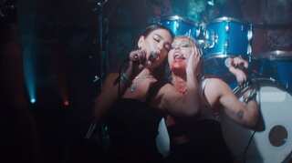 Miley Cyrus and Dua Lipa take a racy road trip in 'Prisoner' music video