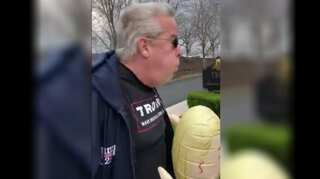 Man donning Trump merchandise charged after 'forcefully exhaling' on two women