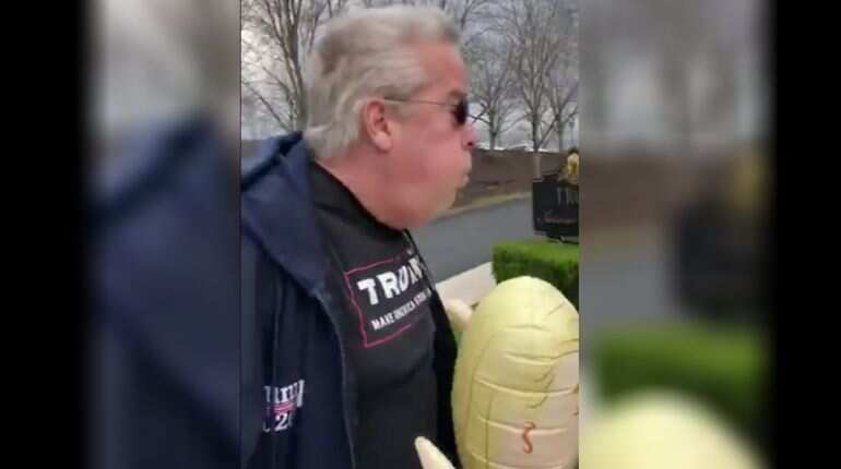 Man donning Trump merchandise charged after 'forcefully exhaling' on two women