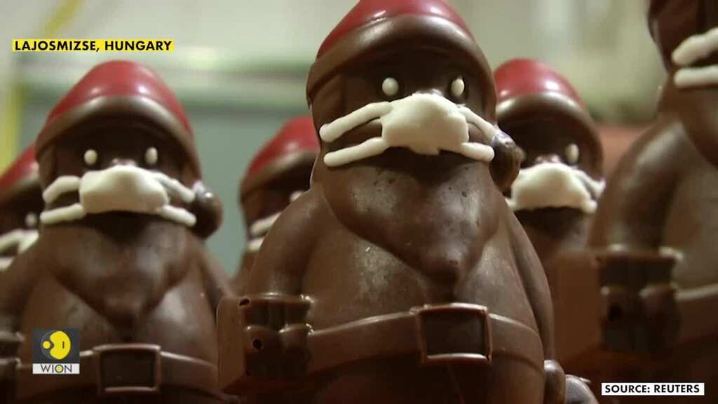 Chocolate Santas in marzipan masks - a coronavirus Christmas treat