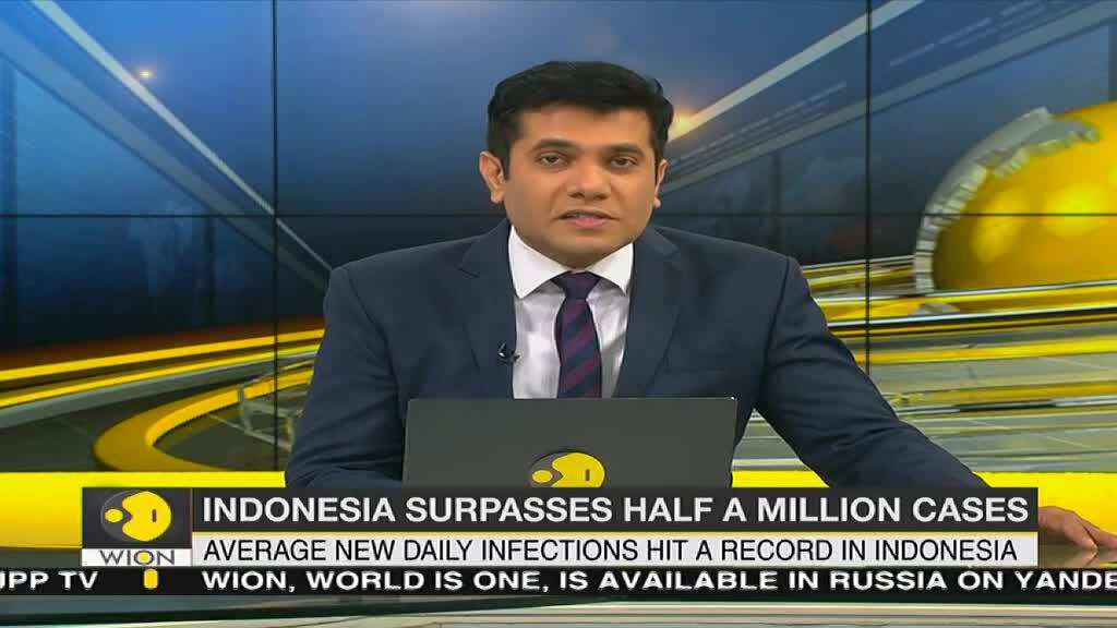 Indonesia hits half million virus cases as infection spike strains hospitals