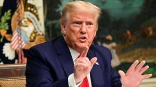 Trump issues series of pardons, including Russia probe figure George Papadopoulos