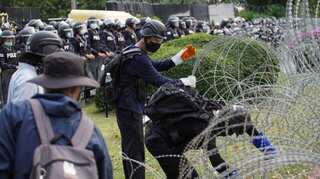 Thailand: Protesters question king's control over military units