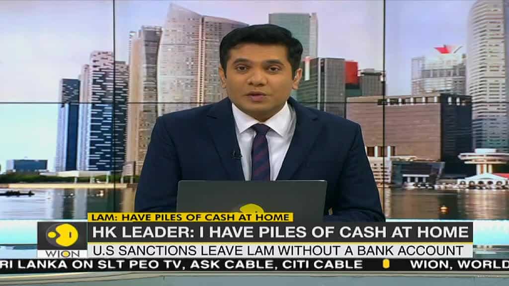 Hong Kong leader says she has 'piles of cash' at home