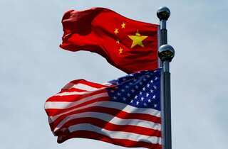 Chinese researchers leave US; agents target Biden team
