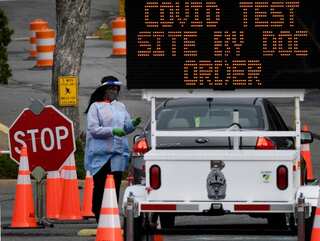 US coronavirus daily death toll highest since April; CDC urges citizens not to travel during Christmas