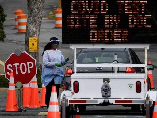 US coronavirus daily death toll highest since April; CDC urges citizens not to travel during Christmas