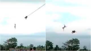 Video shows boy tangled in kite lifted high into the air in Indonesia