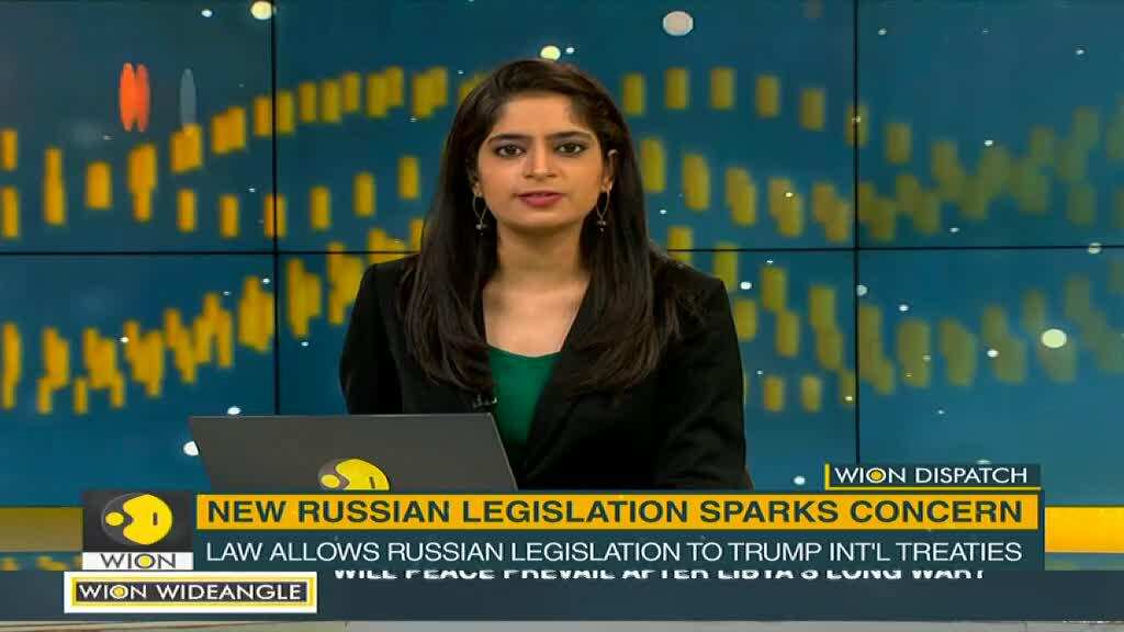 Vladimir Putin signs law allowing Russian legislation to trump international treaties