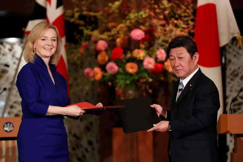 Britain signs free trade deal with Singapore as EU talks falter