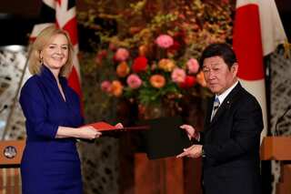 Britain signs free trade deal with Singapore as EU talks falter