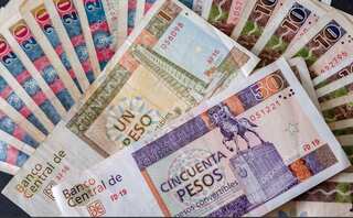Cuba to unify its two currencies as of January 1
