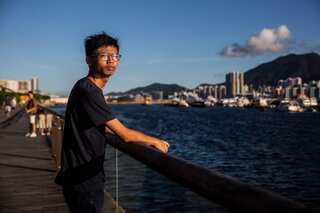 Hong Kong teen found guilty in China flag insult case