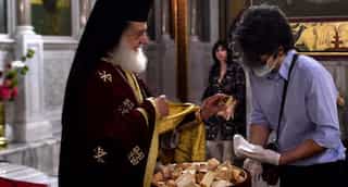 Greece to shorten quarantine, open churches for Christmas