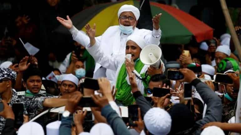 Indonesian leader, Rizieq Shihab, turns himself in for violating COVID-19 restrictions Indonesian leader, Rizieq Shihab, turns himself in for violating COVID-19 restrictions