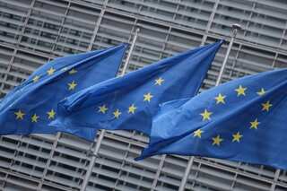 EU urges China to free those detained for reporting after Bloomberg employee held