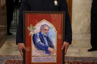 Iran's Khamenei awards military medal to slain nuclear scientist