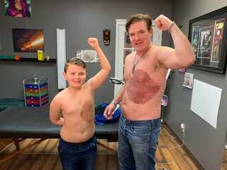 A father in Canada gets tattoo to match son's birthmark
