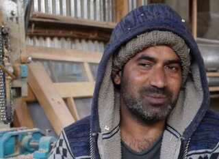 Pulwama: Wheelchair-bound man sets up his own business, provides employment to others