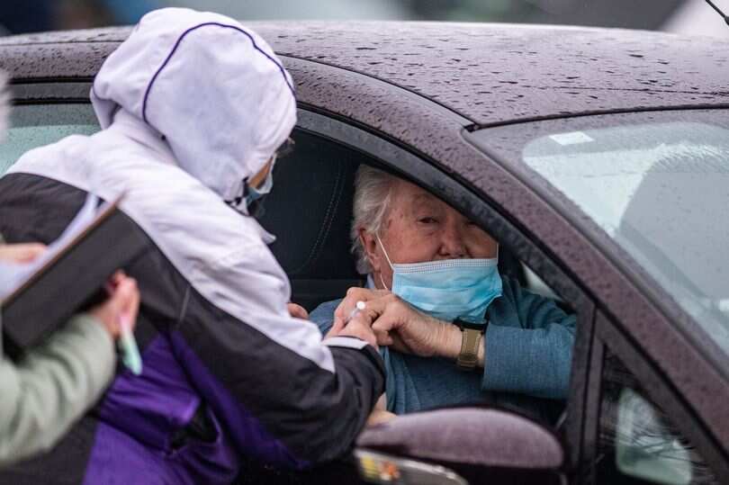 UK becomes first country to introduce drive-through vaccine centres