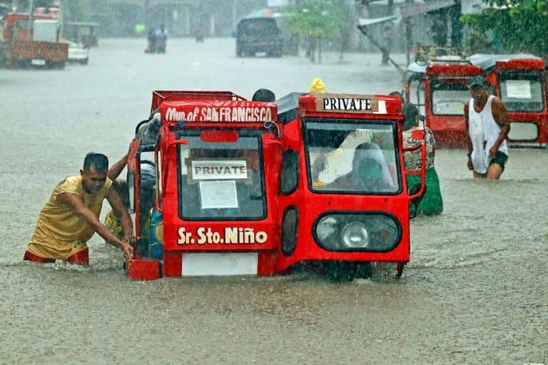 Two dead, hundreds flee floods in Philippine storm Two dead, hundreds flee floods in Philippine storm
