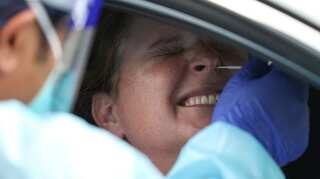 Australian territories impose travel ban on Sydney as COVID-19 cluster grows