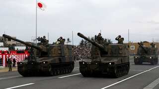 Japan sets record $52 billion military budget to counter China's growing military power