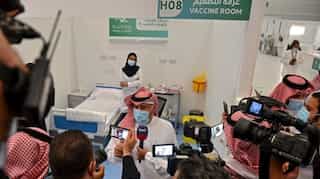 Saudi Arabia halts international flights over new virus variant found in Britain
