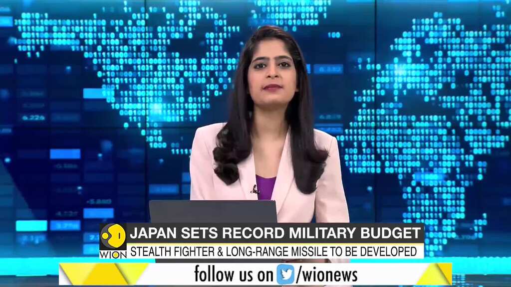 Japan sets record $52 bln military budget with stealth jets, long-range missiles