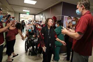 'My second life': California nurse walks out of hospital after eight-month COVID-19 ordeal