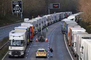 Trucks remain stranded at UK-French border as 3 drivers test COVID-19 positive